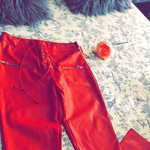Red leather pants.